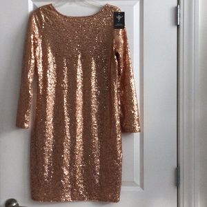 Gold sequins party dress.